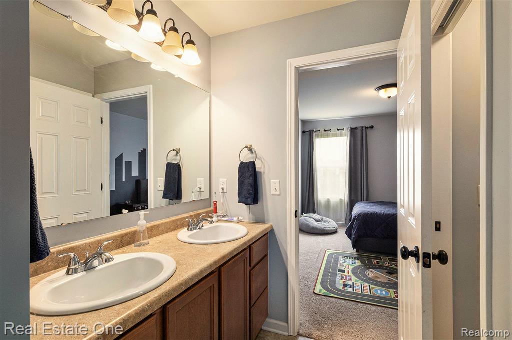 28406 OAKMONTE Circle E, New Hudson, MI 48165 — Photo 17