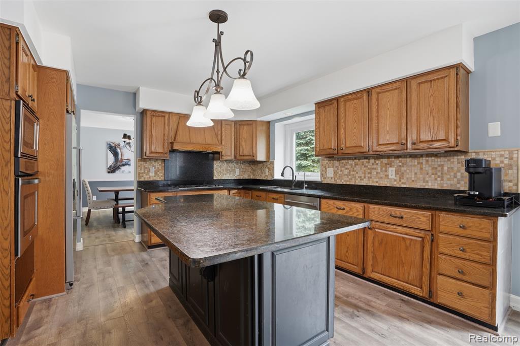 8876 Wintercove Drive, Commerce Twp, MI 48382 — Photo 26