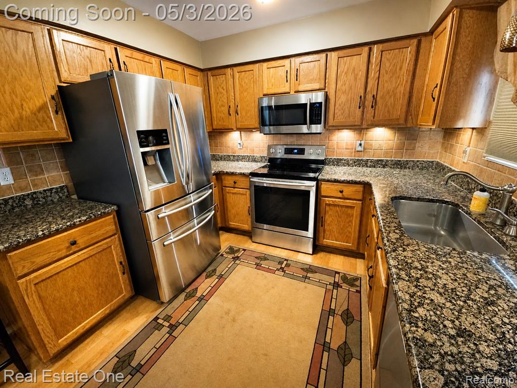 4656 Desert Bridge Court, Highland, MI 48356 — Photo 8