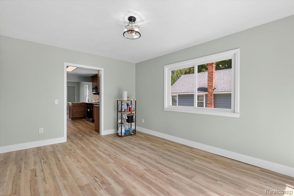 677 Lucille Drive, Wolverine Lake, MI 48390 — Photo 18