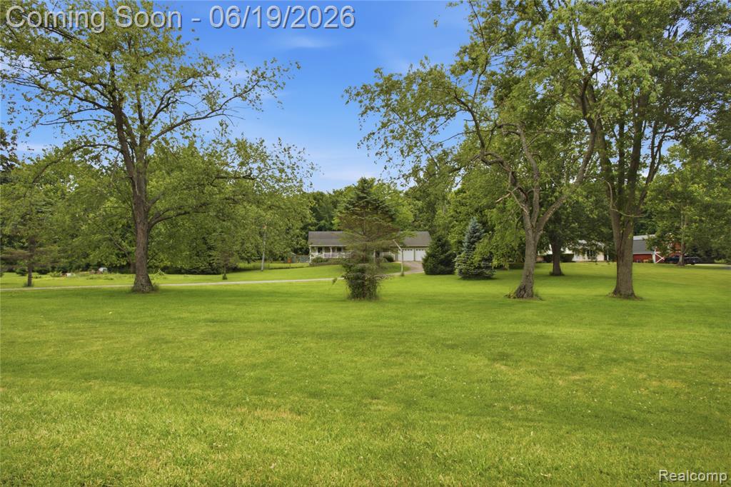 5739 Suntar Valley Drive, Fowlerville, MI 48836 — Photo 19