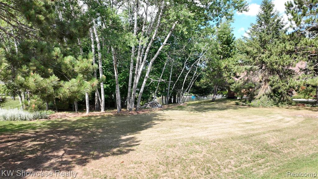 1033 Cantabrian Drive, Weidman, MI 48893 — Photo 2