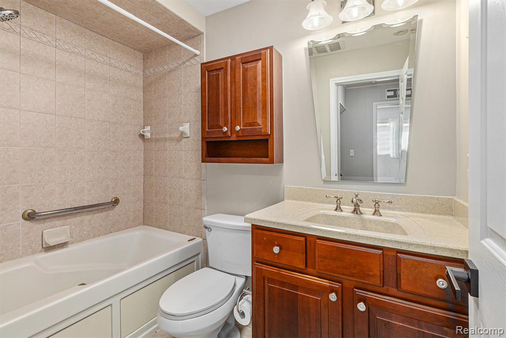 2145 Helmsford Drive, Wolverine Lake, MI 48390 — Photo 23
