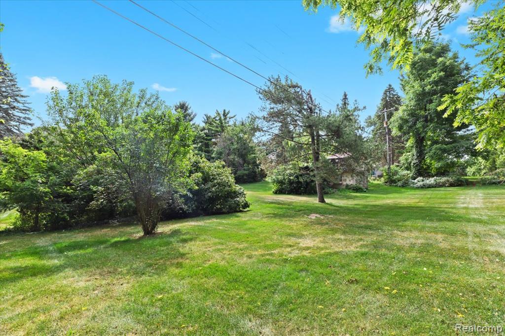 60023 Trailwood Street, Washington, MI — Photo 41