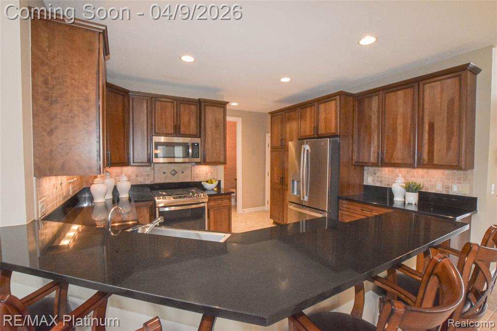 9092 Lake Dominion Drive, Brighton, MI 48114 — Photo 21
