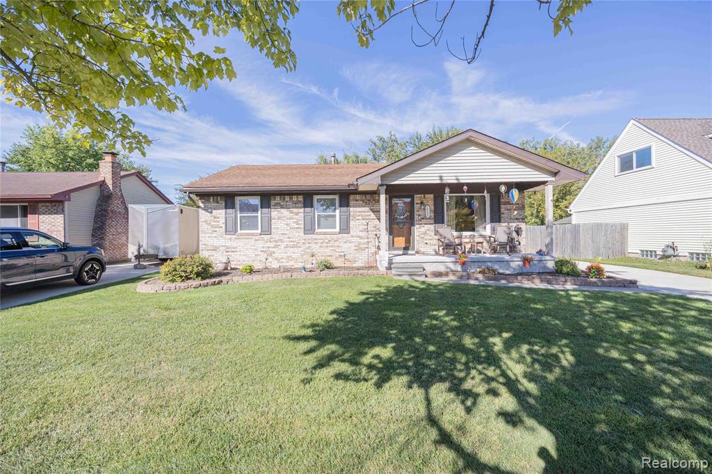 25298 Castlewood Drive, Woodhaven, MI 48183 — front exterior