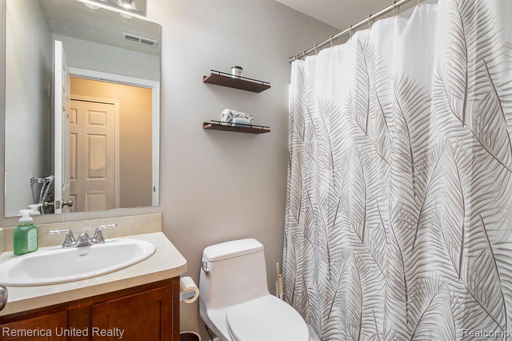 302 LEGATO Drive, Walled Lake, MI 48390 — Photo 18