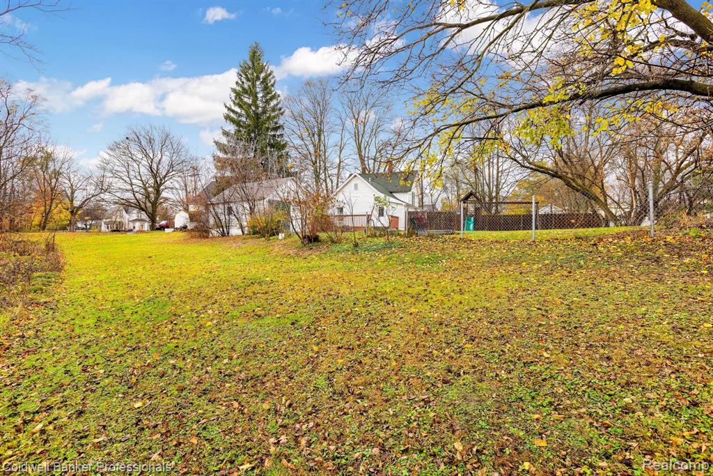 407 OAKLAND Street, Holly, MI 48442 — Photo 27