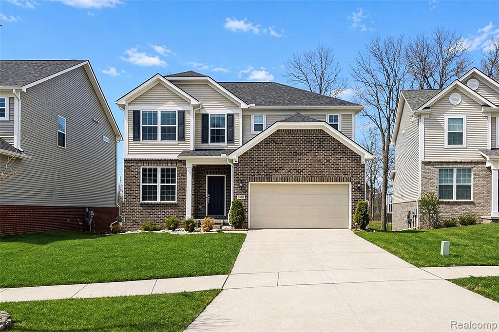 58904 Calabrese Drive, South Lyon, MI 48178 — front exterior
