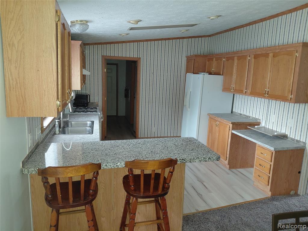 4740 Spring Creek Drive, Howell, MI 48843 — Photo 3