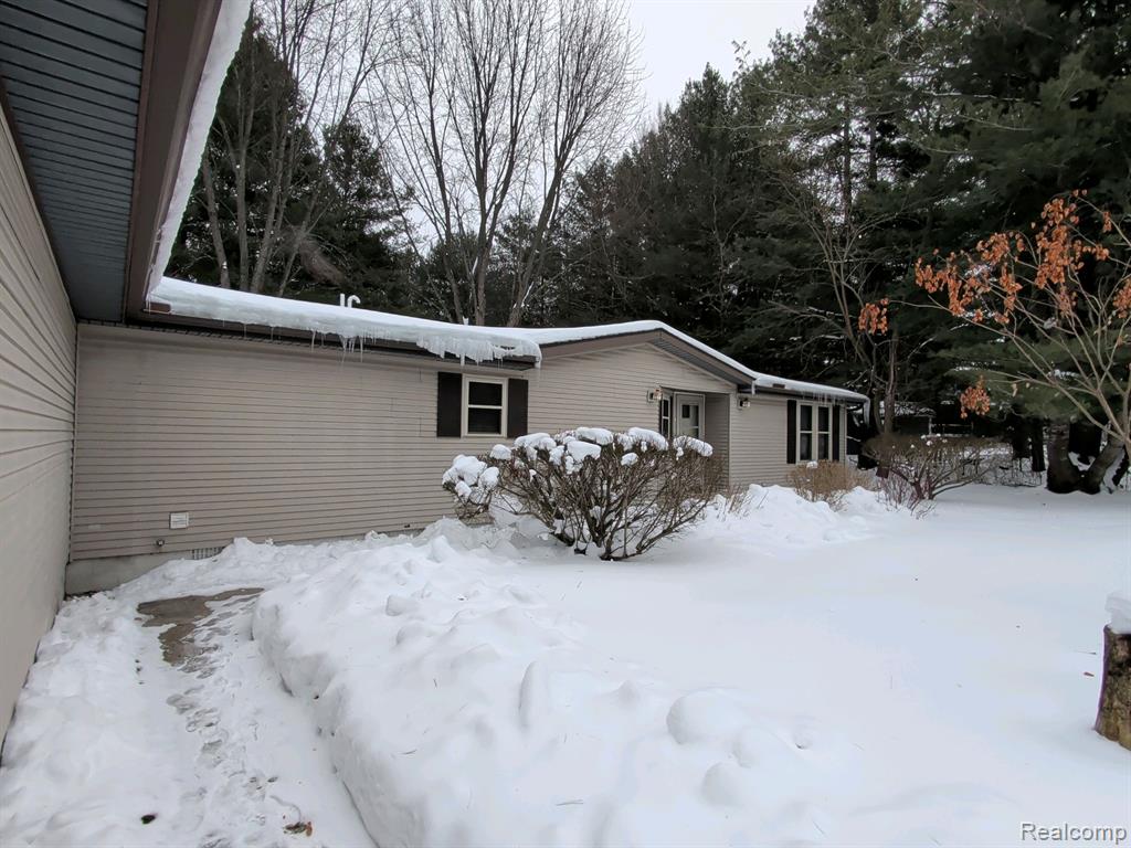 10342 Shore Drive, Williamsburg, MI 49690 — front exterior