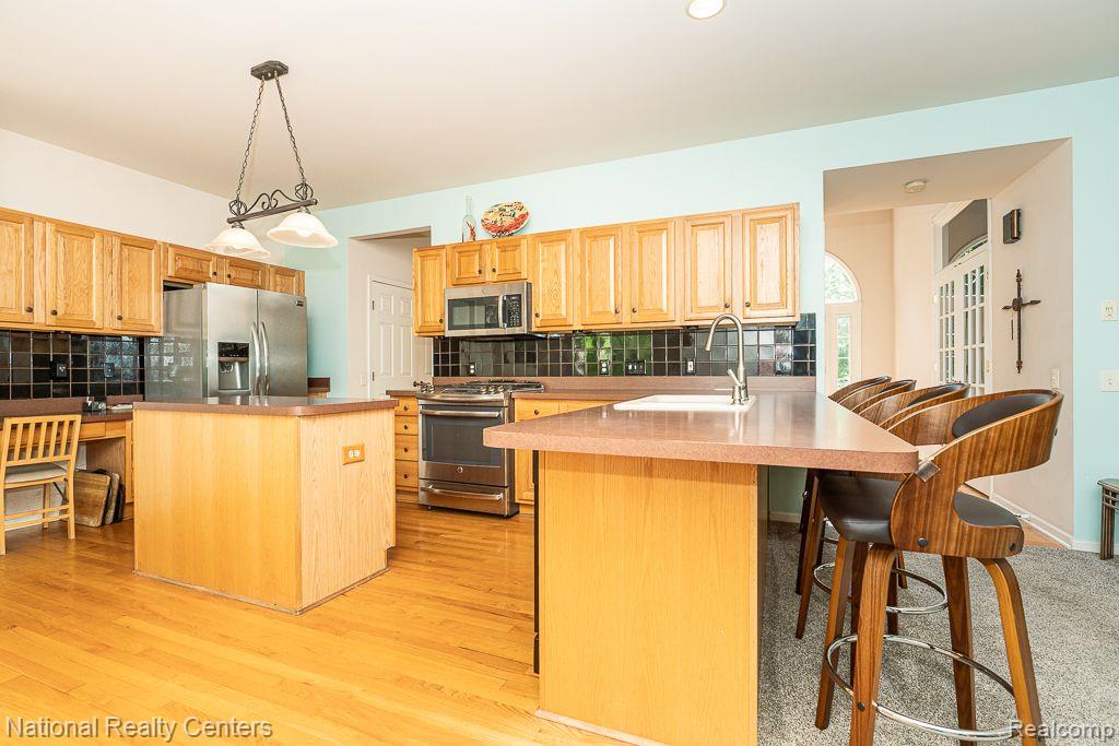 7914 BROOKWOOD Drive, Clarkston, MI 48348 — Photo 10