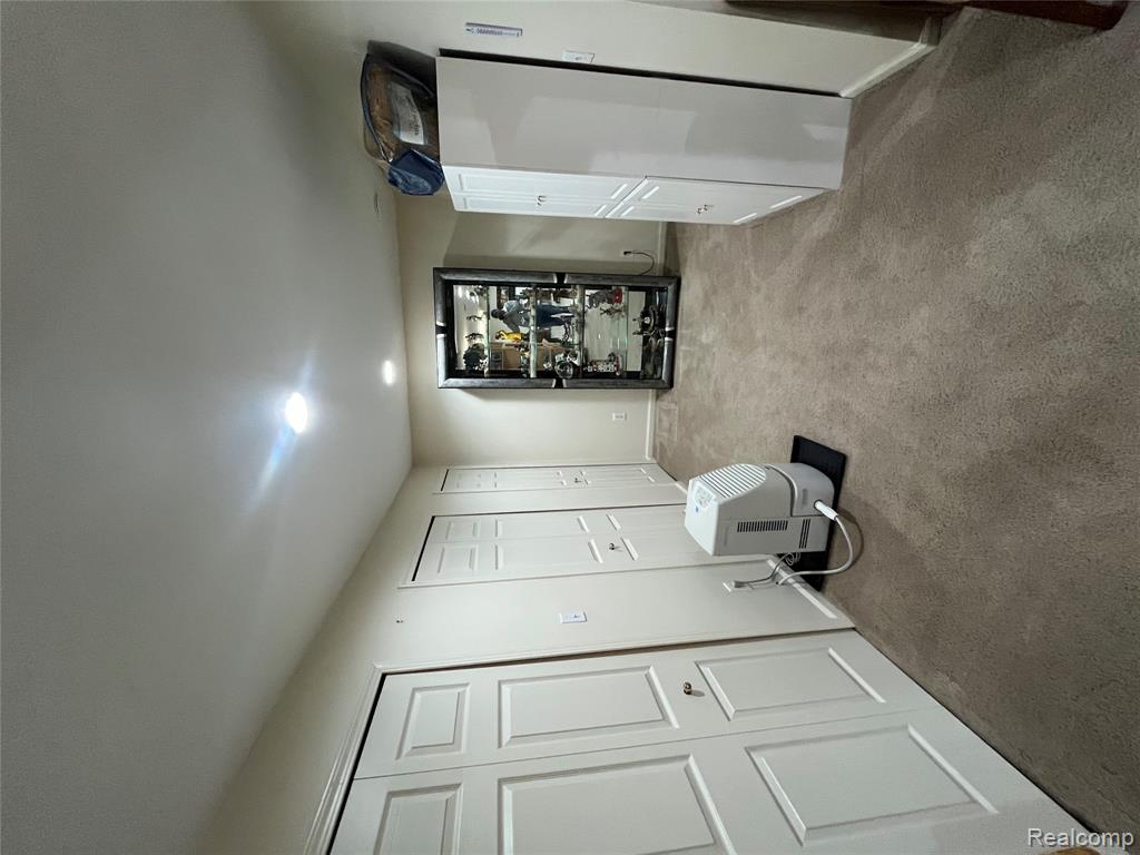 828 Woodhaven Drive, Commerce Twp, MI 48390 — Photo 34