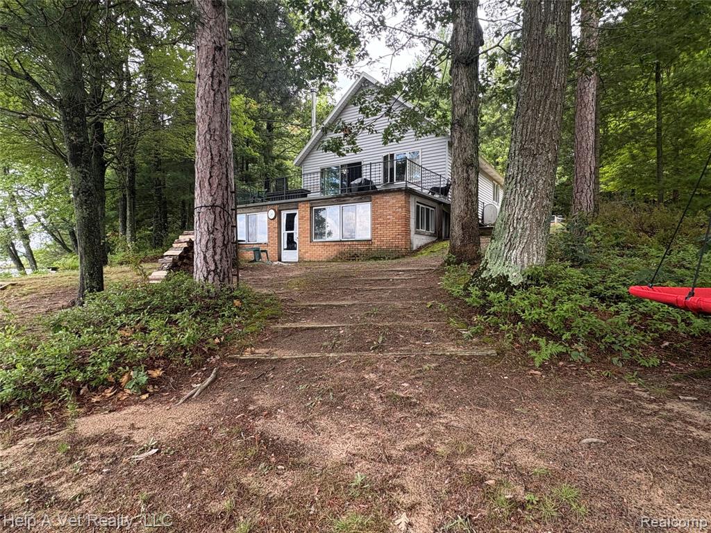 10340 Mud Lake Road, Interlochen, MI 49643 — front exterior