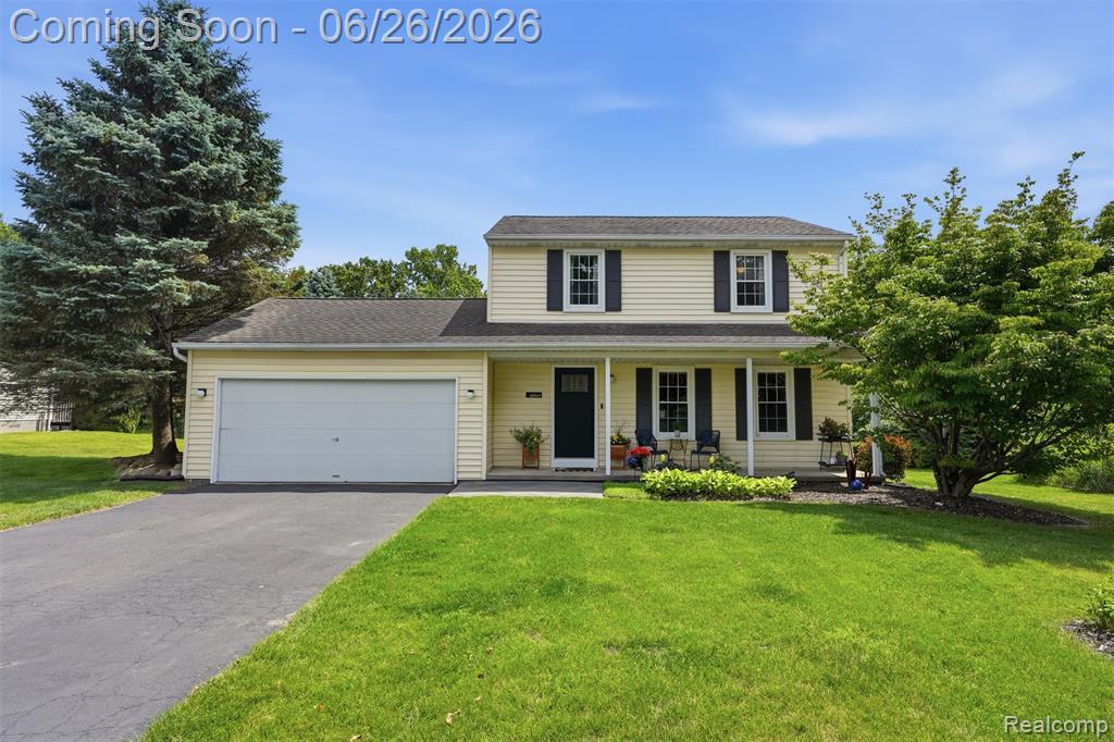 60569 Town Square Street, New Hudson, MI 48165 — front exterior