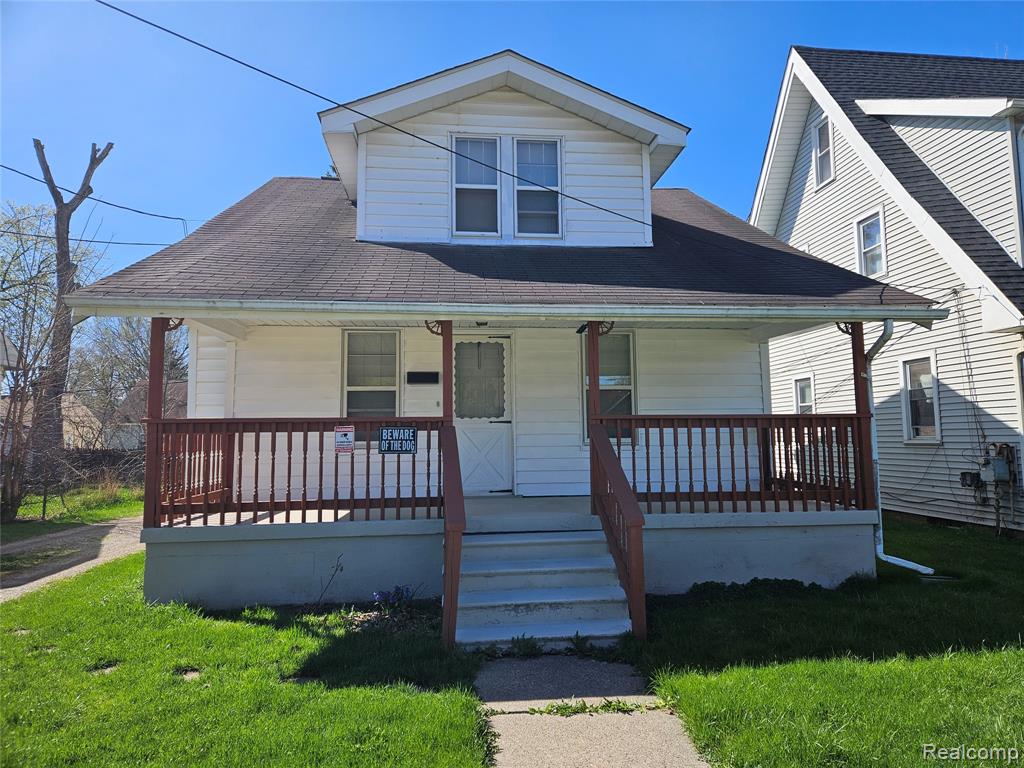 621 W Atherton Road, Flint, MI 48507 — front exterior