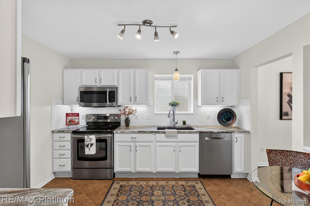 540 Snowfall Court, Howell, MI 48843 — Photo 14