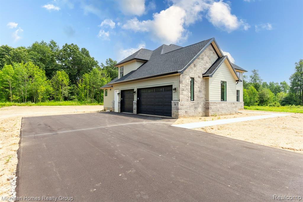 2910 LOON Drive, Wixom, MI 48393 — Photo 20
