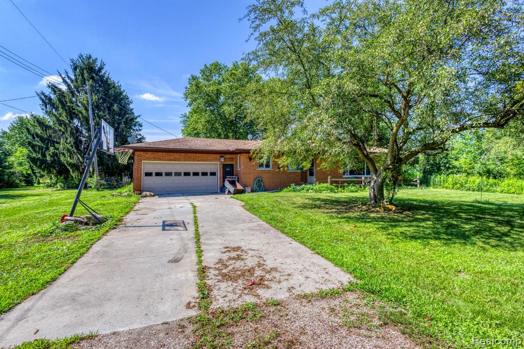 9805 Dolan Road, Columbus, MI — front exterior