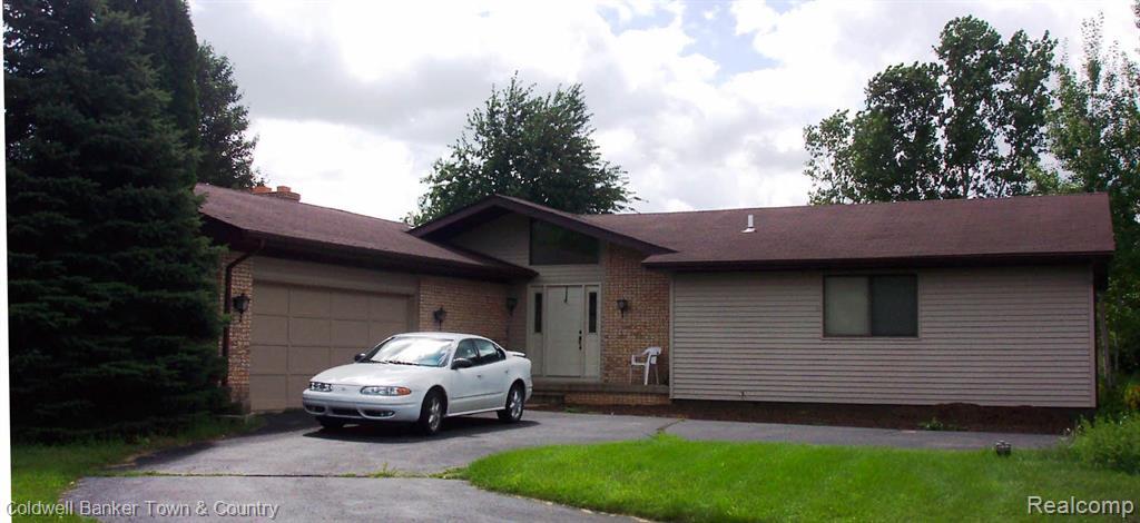 8777 Tamarack Drive, Brighton, MI 48116 — front exterior