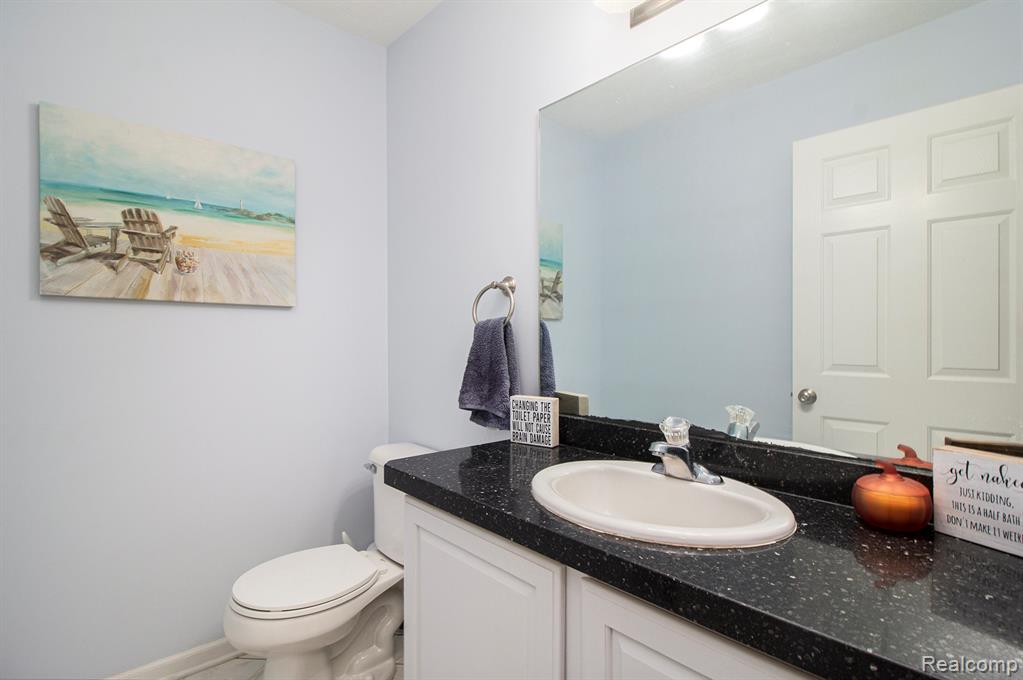 703 N Hughes Road, Howell, MI 48843 — Photo 17