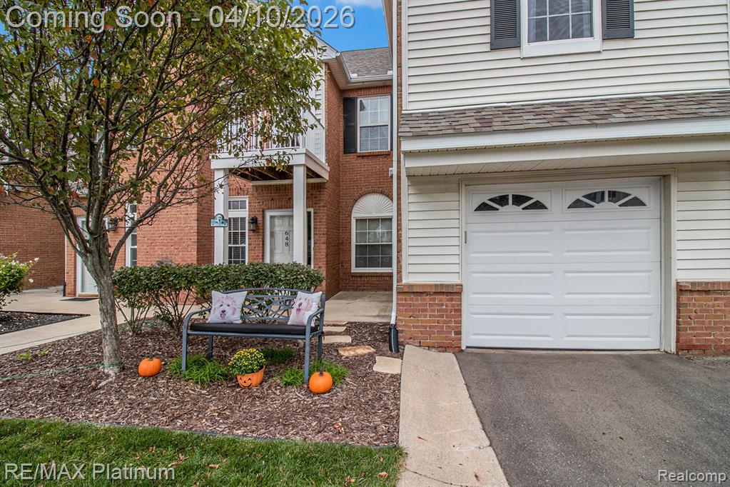 648 Olde English Circle, Howell, MI 48855 — front exterior