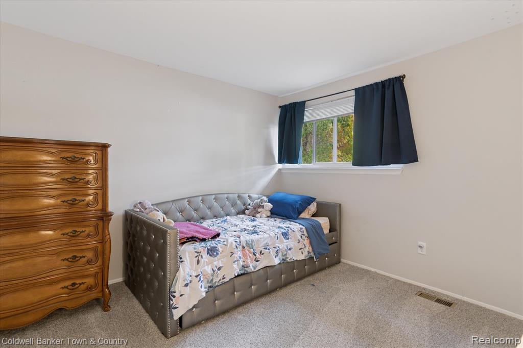 616 Rickett Road, 124, Brighton, MI 48116 — Photo 17