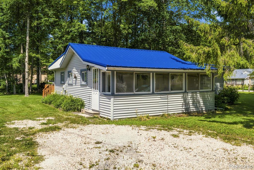 7496 Forest Drive, Lexington, MI 48450 — front exterior