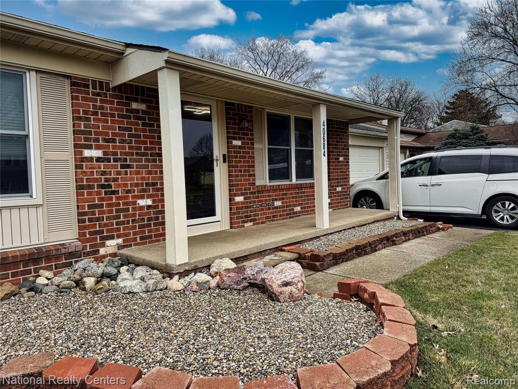 40684 Village Wood Road, Novi, MI — front exterior
