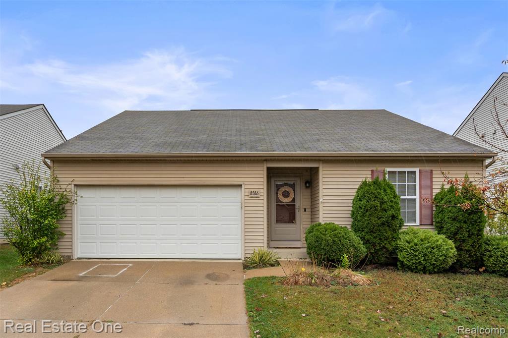 8586 Cass River Drive, Fowlerville, MI 48836 — front exterior