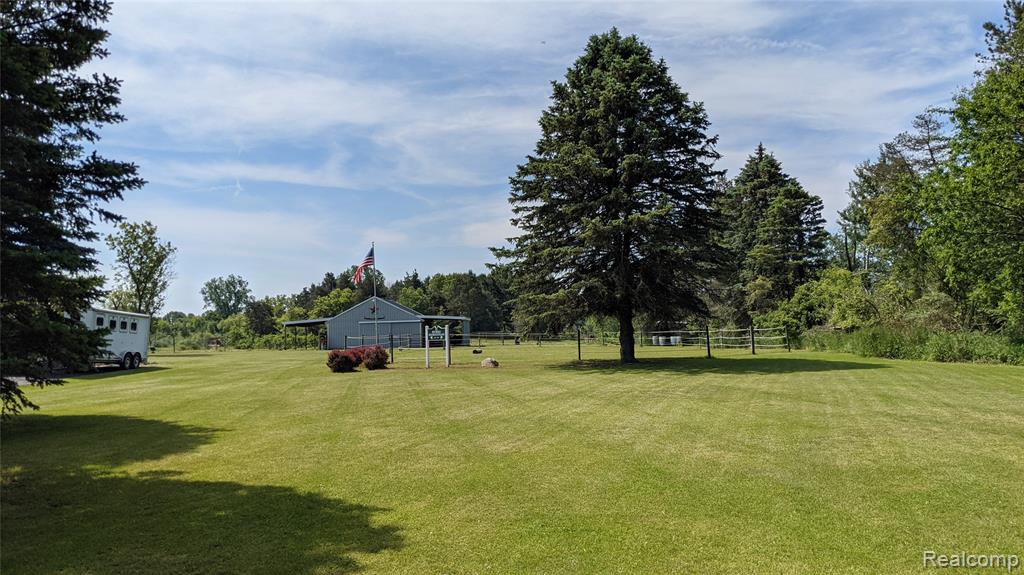 9753 W Coon Lake Road, Webberville, MI 48892 — Photo 49