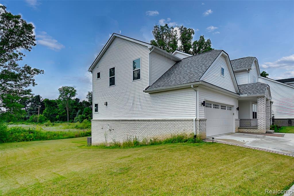 569 Pattan Drive, Wixom, MI 48393 — Photo 42