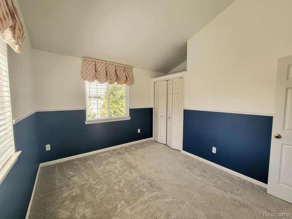 124 Champlain Boulevard, Howell, MI 48843 — Photo 29