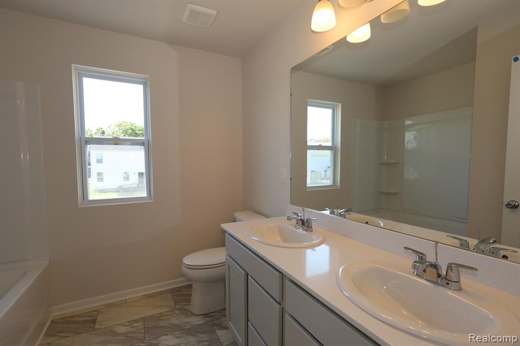 634 Harvest Way, Chelsea, MI 48118 — Photo 16