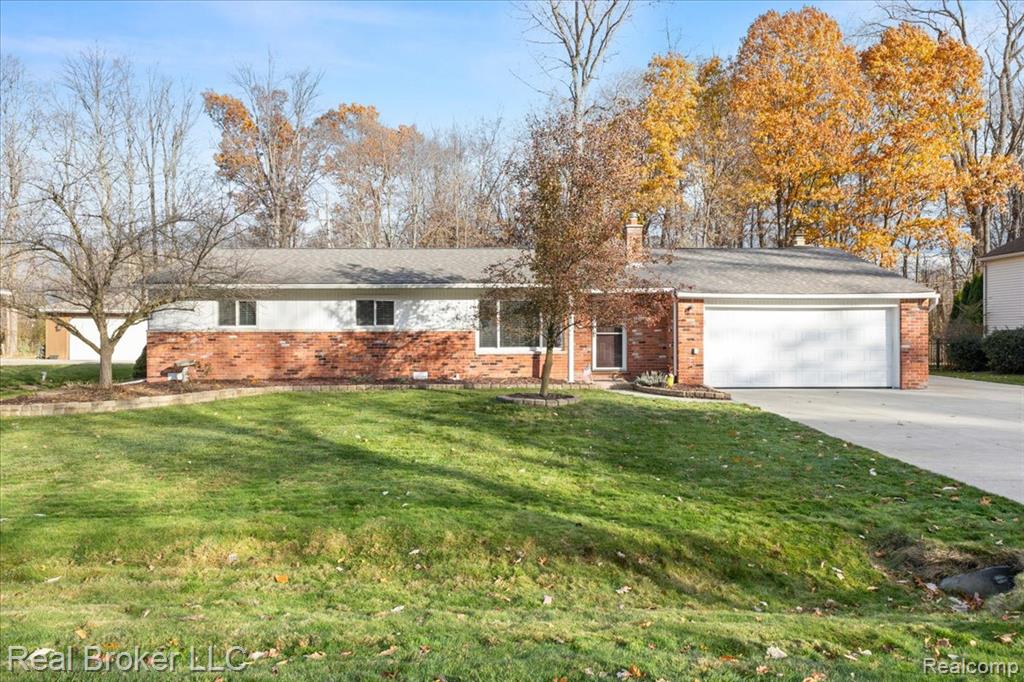 52048 Brentwood Drive, Shelby Twp, MI 48316 — front exterior