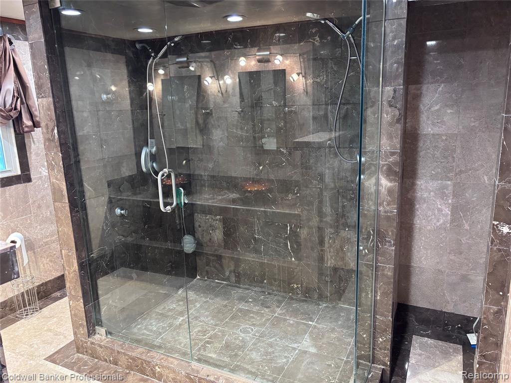 Primary Bedroom Full bath with a shower stall