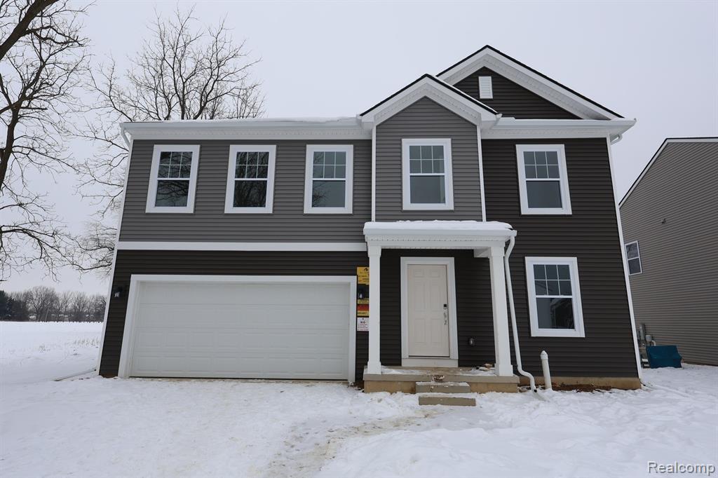 684 Countryside Drive, Chelsea, MI 48118 — front exterior