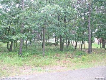 9853 Whispering Pines #37, Pigeon Vlg, MI — front exterior