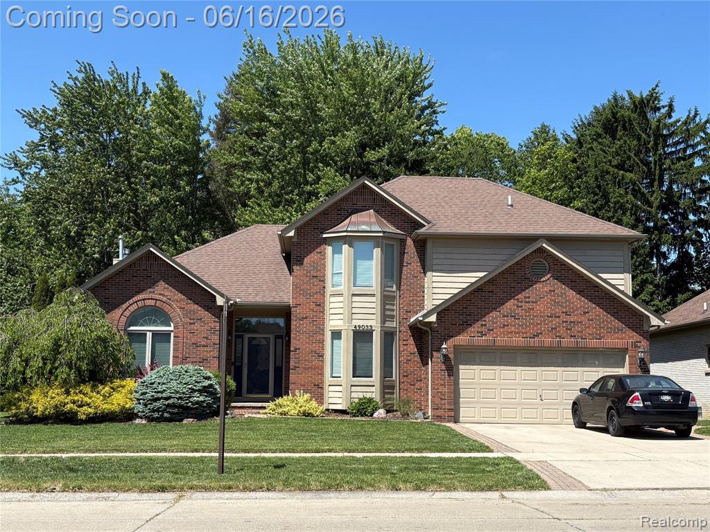 49033 Deerfield Park, Macomb, MI 48044 — front exterior