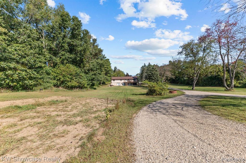 766 WHITE HOUSE Drive, Highland, MI 48356 — Photo 67