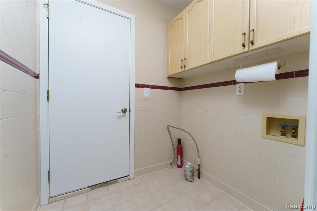 469 Winwood Circle, 121, Walled Lake, MI 48390 — Photo 11