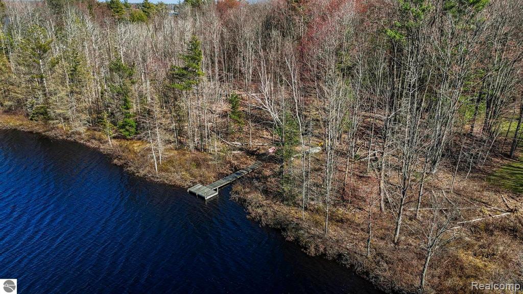 9086 N TOTTENHAM Drive, Traverse City, MI 49685 — Photo 16