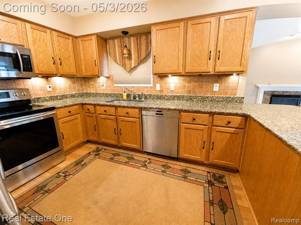 4656 Desert Bridge Court, Highland, MI 48356 — Photo 7