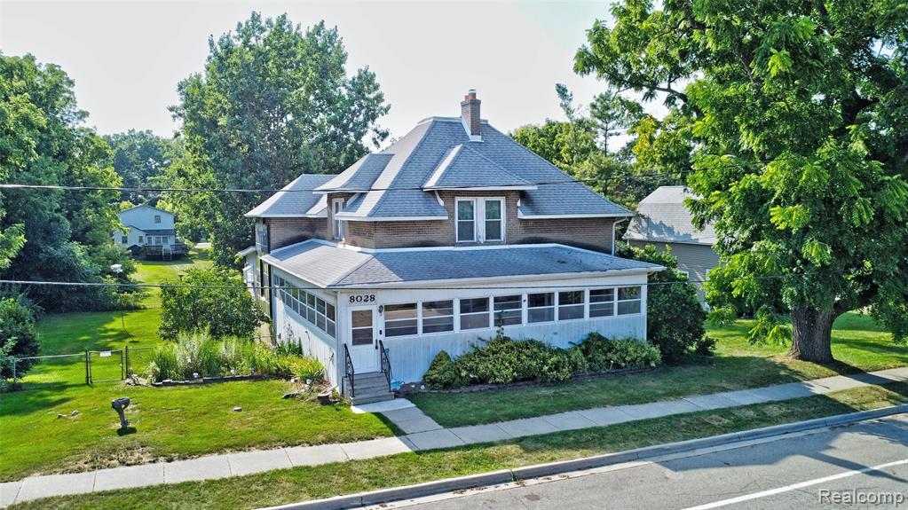 8028 Clarence Street, Goodrich Vlg, MI — front exterior