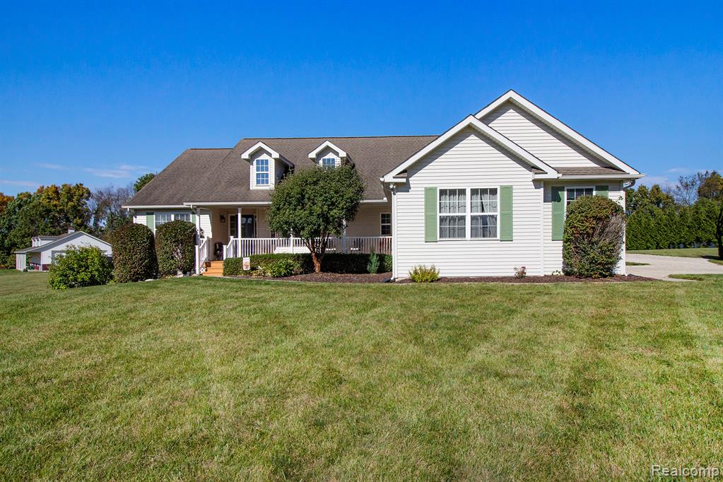 703 N Hughes Road, Howell, MI 48843 — front exterior