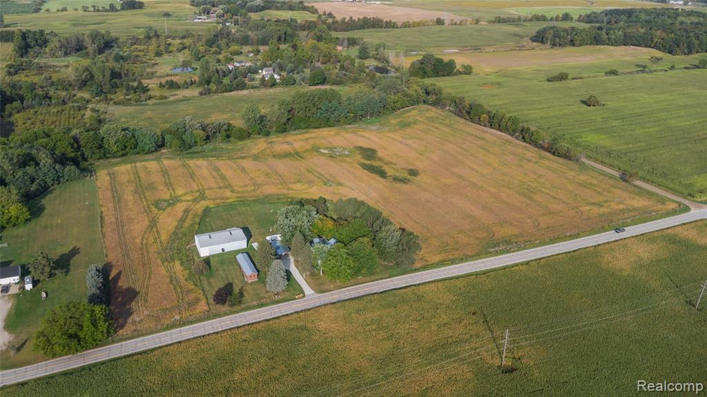 7570 Fostoria Road, Mayville Vlg, MI 48744 — front exterior