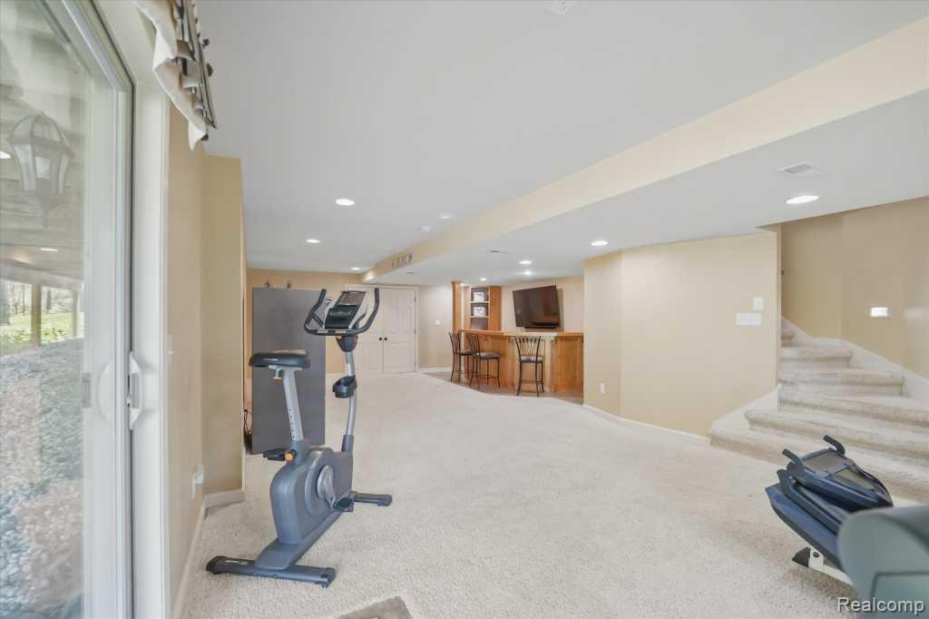 7042 Autumn Wood Drive, Brighton, MI 48116 — Photo 25