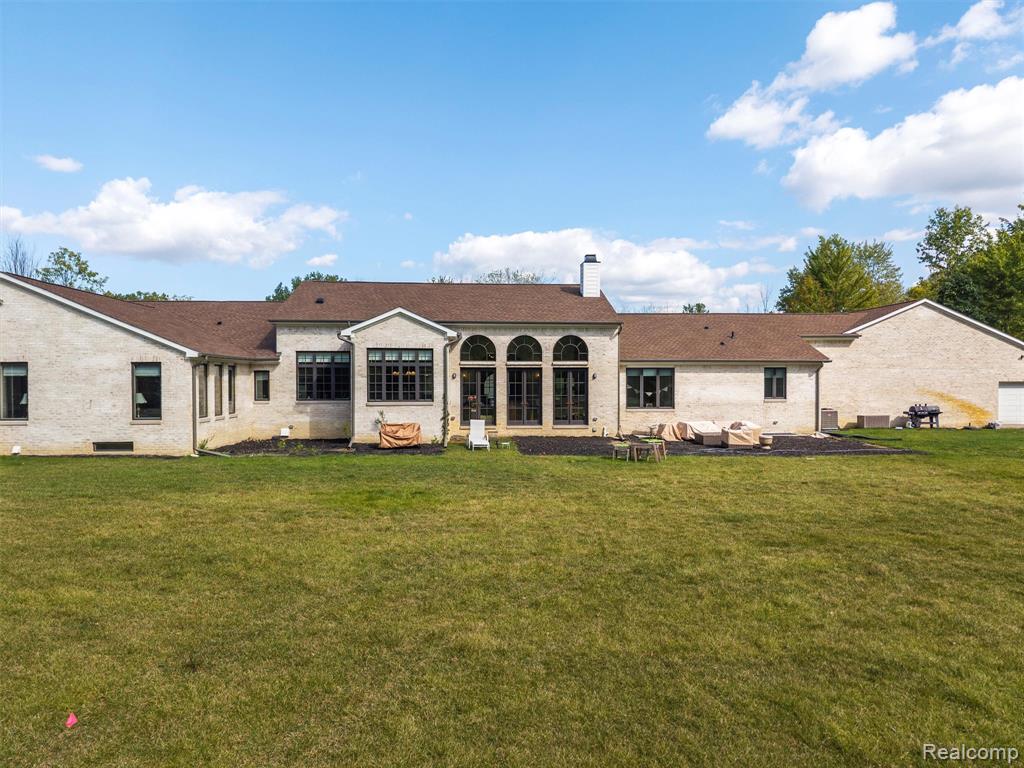8799 S Rushton Road, South Lyon, MI 48178 — front exterior