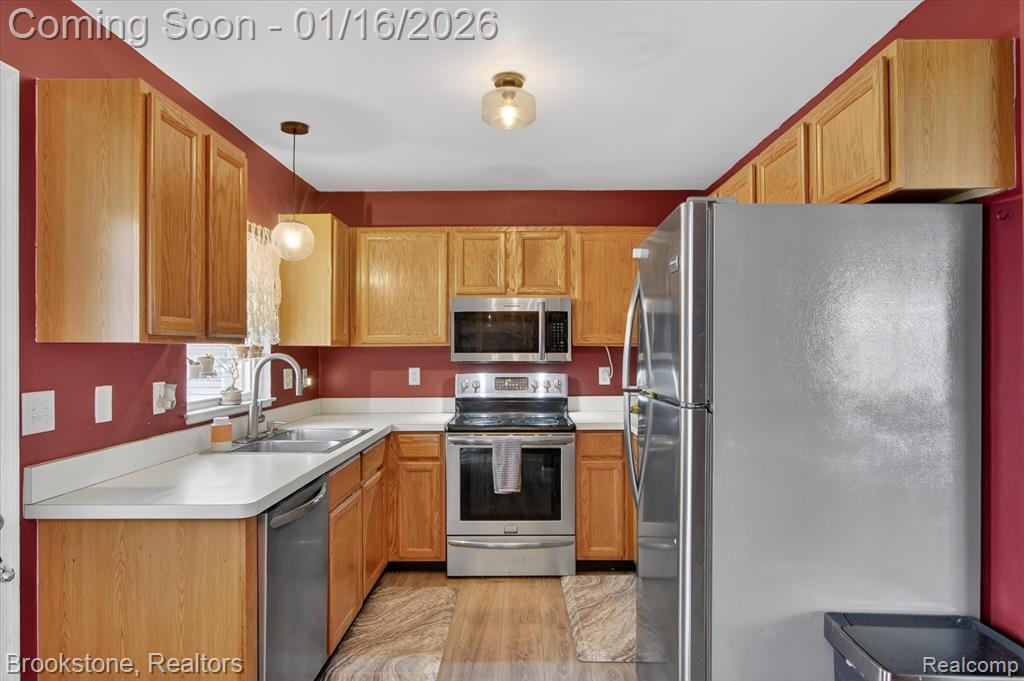 875 Adelaide Drive, Wolverine Lake, MI 48390 — Photo 15