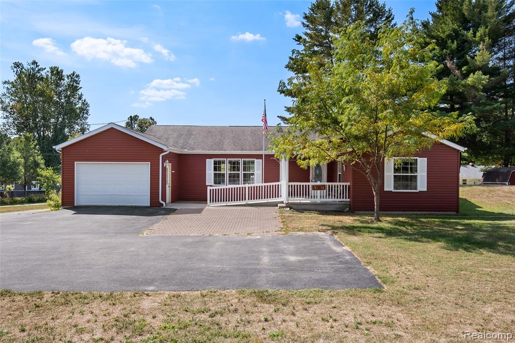 18415 12 Mile Road, Big Rapids, MI 49307 — front exterior
